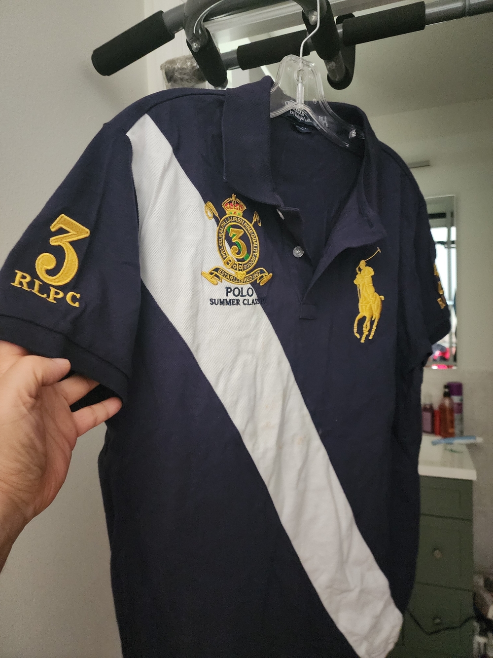 Ralph Lauren Navy Polo with White Diagonal Stripe and Yellow Embroidered Crest - Picture 2 of 7
